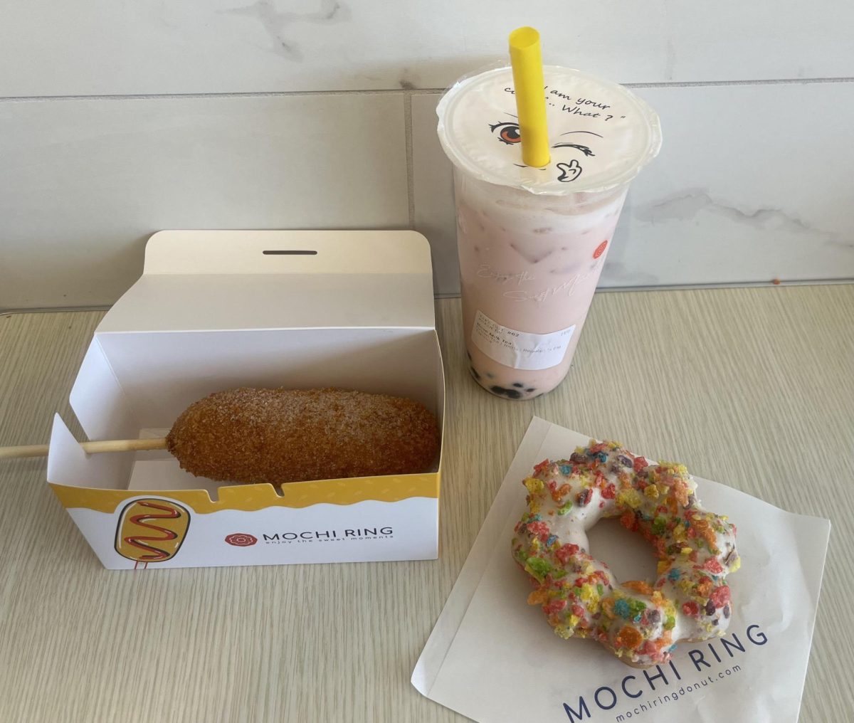 EVELYN’S ORDER FROM MOCHI RING
A Korean Corn Dog, Fruity Pebbles donut, and Rose Boba milk tea made up this order.