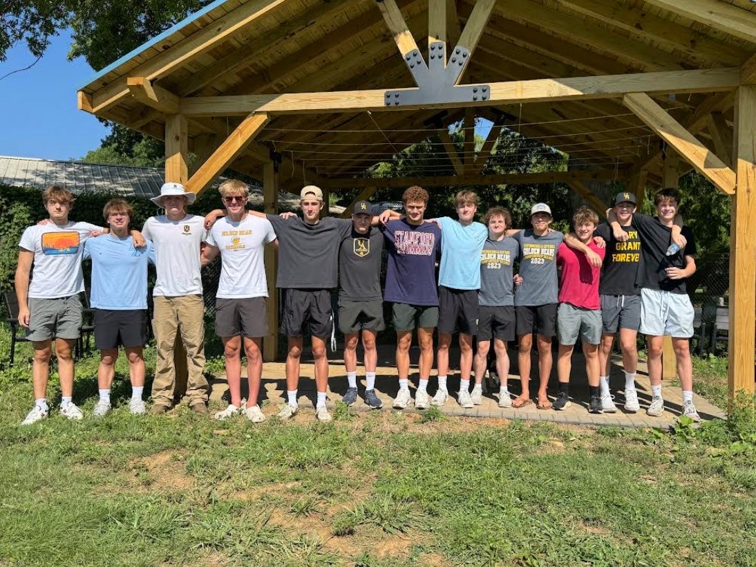 Water Polo at Work- The UAHS boys water polo team lines up to take a photo
at the Mid-Ohio Foodbank after harvesting fruits and vegetables.